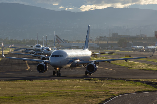 Mexico City, Mexico - October 20, 2019: Interjet A320 taxing to the runway at Mexico City Intl. Airport.