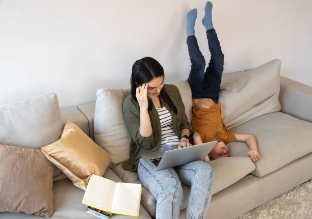 istock Tired lady having distant work during self-isolation stock photo 1225706427