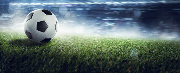 istock Soccer ball  in a stadium 1225706808