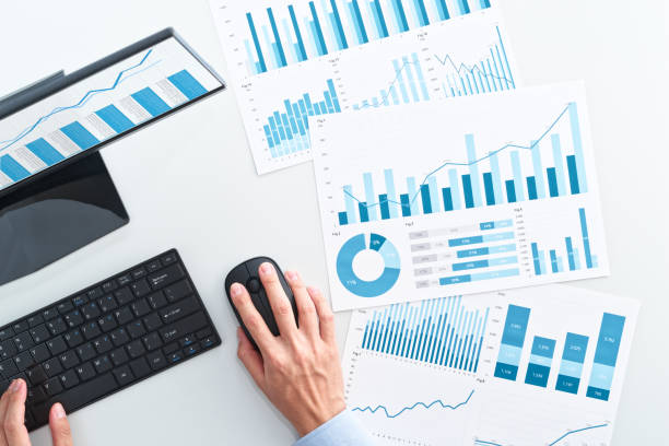 istock Top view of business man using spreadsheet. 1225709571