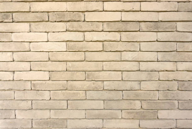 istock Wall of grey color clay brick texture in background 1225713136