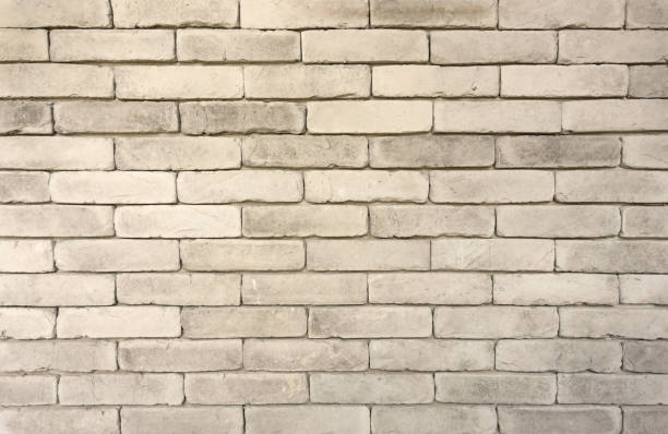 istock Wall of grey color clay brick texture in background 1225713159
