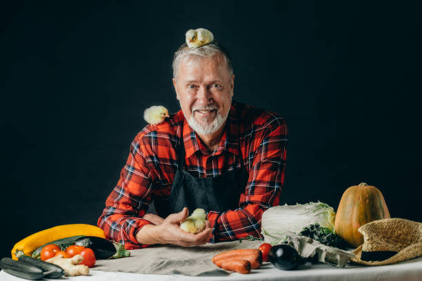 istock broiler poultry. positive poultry breeder looking at the camera 1225723496