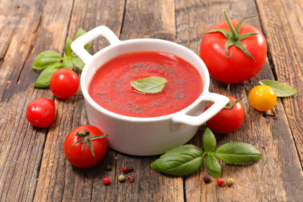 istock tomato sauce with basil on wood background 1225724932