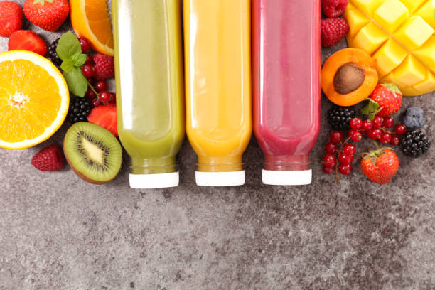 istock fruit juice with fresh fruits- top view 1225725663