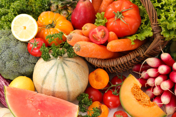 istock assorted of fruit and vegetable isolated on white background 1225725667