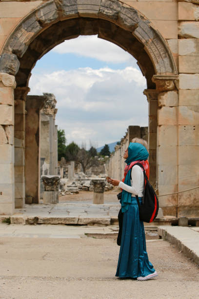 istock young asian hijab taking vacation in Rome Italy 1225728205