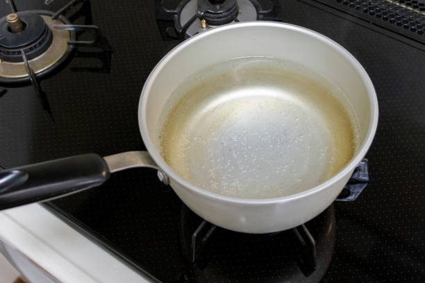 istock Boiling the water in the pot 1225729071
