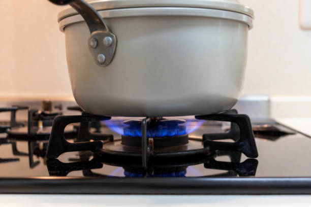 istock Metal pot heated by gas stove 1225729084
