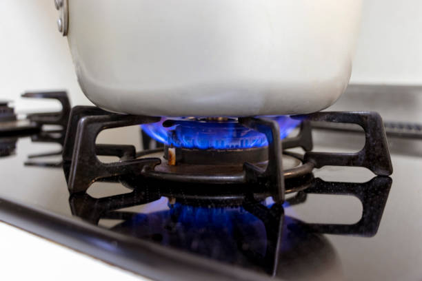 istock Metal pot heated by gas stove 1225729085