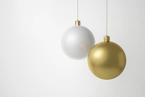 Golden of christmas balls hanging on white background with celebration decoration concept. Hanging of glossy balls for christmas festival . 3D rendering.
