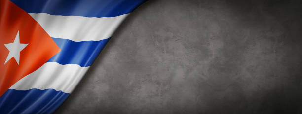 istock Cuban flag on concrete wall banner 1225732335