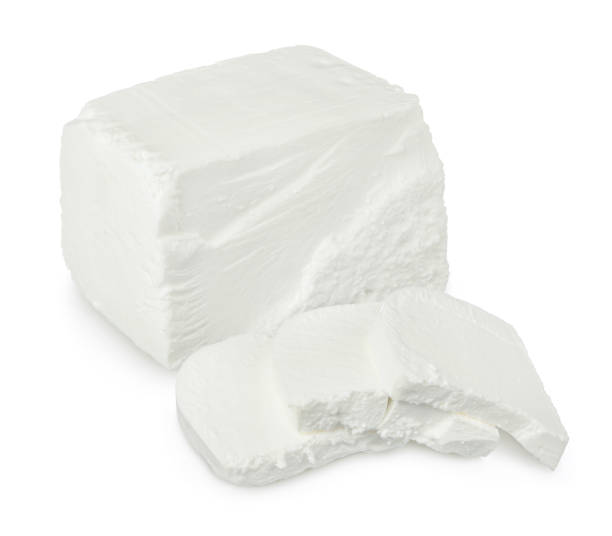 istock Feta cheese isolated on white background. With clipping path and full depth of field 1225733194