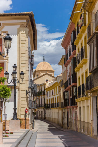Colorful houses and church dome in Lorca Colorful houses and church dome in Lorca, Spain lorca stock pictures, royalty-free photos & images