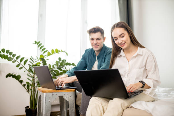 istock young caucasian couple work from home 1225735529