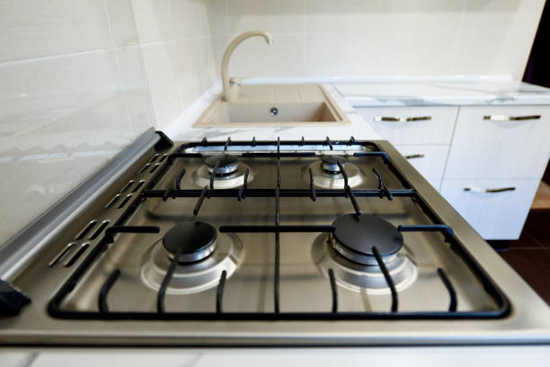 istock Stove on an empty kitchen in an apartment. Selective focus. 1225740428