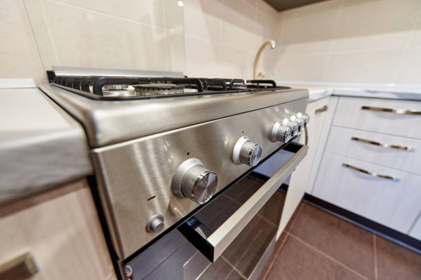 istock Oven on an empty kitchen in an apartment. 1225740572
