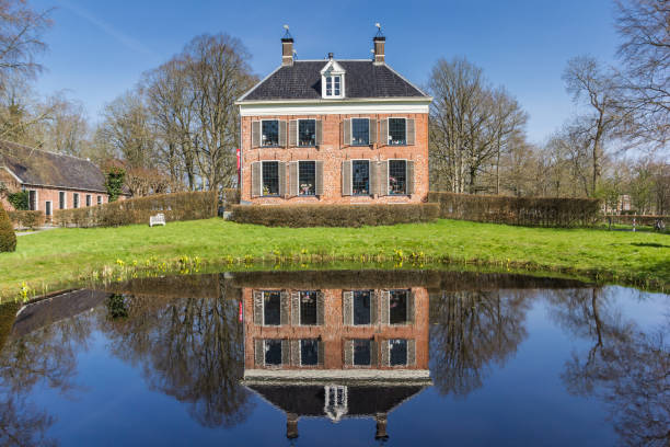 Beautiful old house (earlier a small church) in a Dutch town of Giethoorn. Giethoorn is sometimes called \