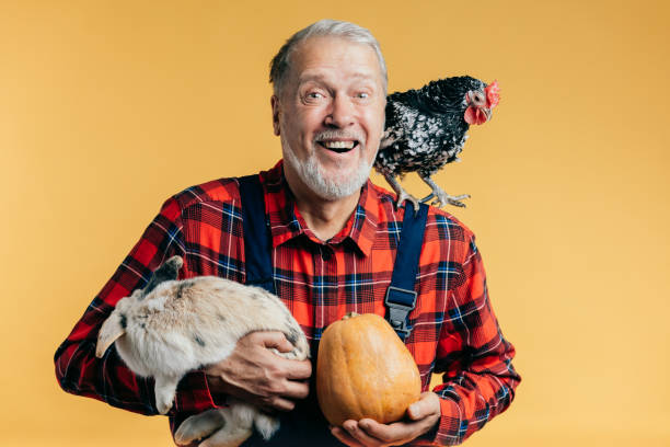 istock positive happy old farmer loves his work 1225742143