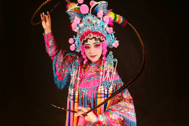 one peking opera actress performing on stage stock photo