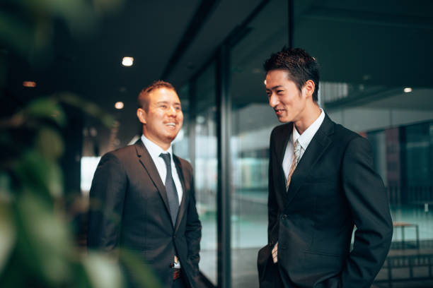 istock business man laughing during the meeting 1225745696