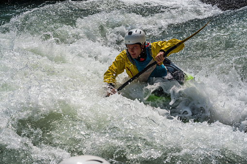 Kayaker runing the rapids