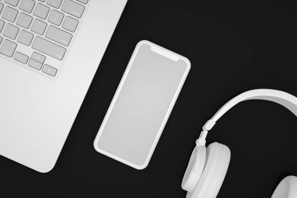 istock Blank Screen Smartphone and Laptop on Black Background 1225751137