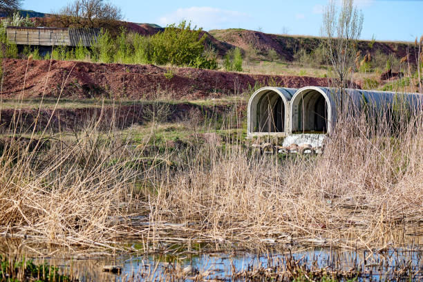 The discharge of wastewater into the river. Environmental pollution. Environmental problem.