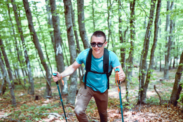 istock Handsome Male Hiking In Forest 1225756622