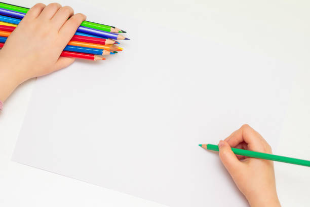 istock Child is drawing by colored pencils. 1225764289