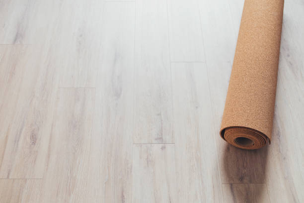 istock Cork underlay on a new laminate floor 1225764732
