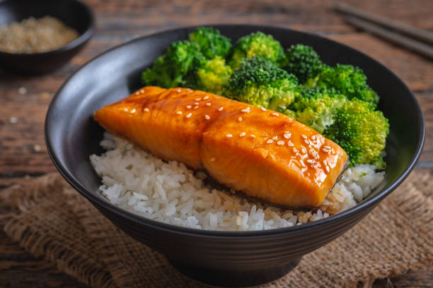 istock Salmon teriyaki with rice and vegetable in bowl 1225765844