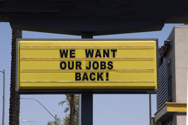 istock Billboard saying We Want Our Jobs Back! Anti-lockdown protests. 1225767635