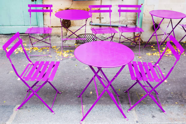 istock vintage pink table and chairs in Paris 1225767722