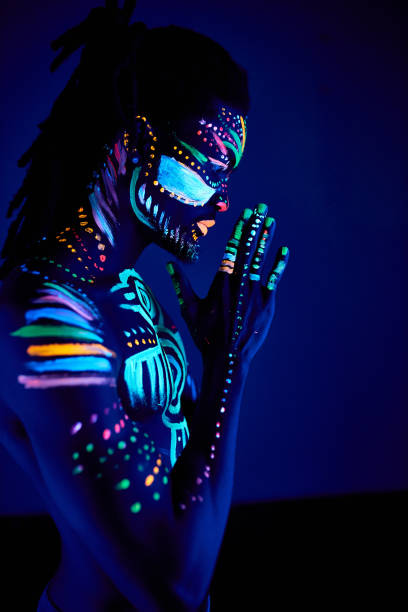 istock prayer male with fluorescent prints isolated 1225770075