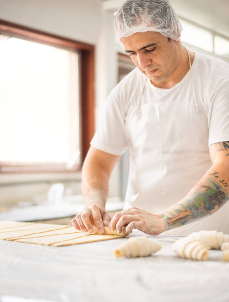 istock He's an expert in making croissants 1225770853