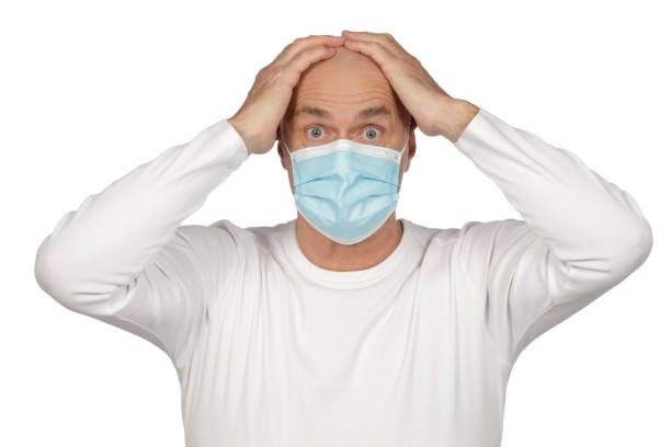 istock Man with baldness wears mouthguard 1225771128