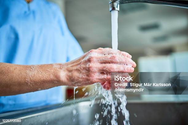 Doctor Washing Hands Stock Photo - Download Image Now - Washing Hands, Hygiene, Hospital