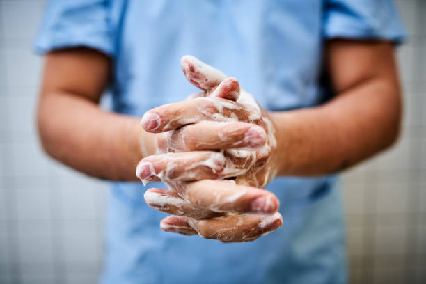 istock Male nurse washing hands 1225772732