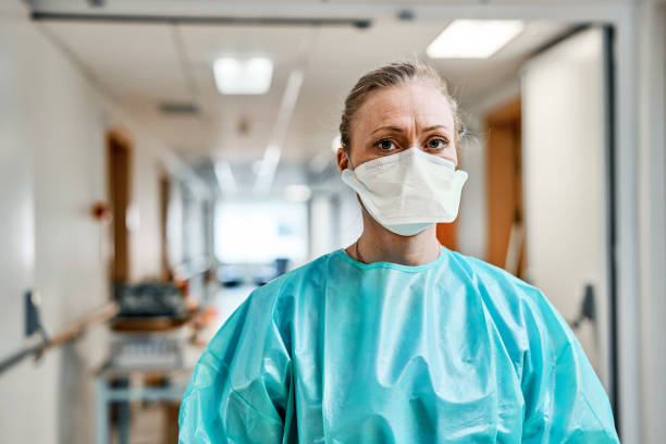 istock Essential healthcare worker wearing face mask during covid 19 1225772814