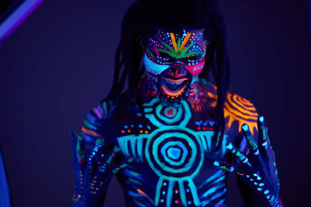 istock man with fluorescent prints on body gnashing his teeth 1225773019
