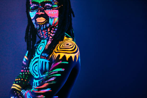 istock mysterious male with fluorescent body art 1225773837