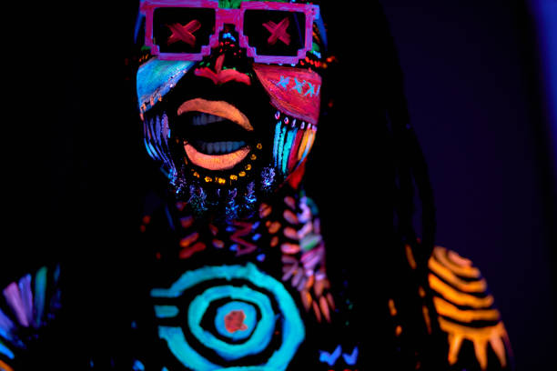 istock young cyber raver dance, fluorescent make-up 1225774122