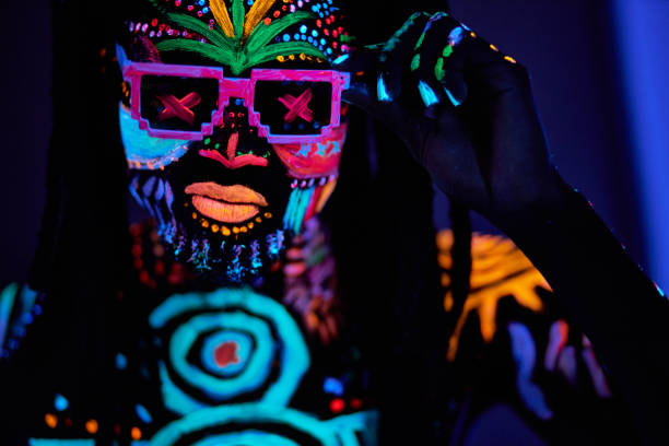 istock fantastic mysterious male with UV body art 1225774123