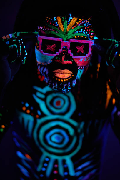 istock cool african man with fluorescent body art dancing isolated 1225774233