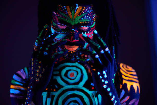 istock fantastic mysterious male with UV body art 1225774526