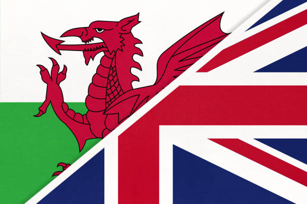 United Kingdom of Great Britain and Ireland and Wales national flag from textile. United Kingdom of Great Britain and Ireland and Wales national flag from textile. Relationship, partnership and economic between European countries. independence document agreement contract stock illustrations