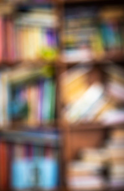istock Unfocused A stack of books on book shelf, unfocused 1225776417