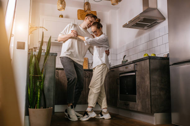 istock beautiful married couple dance at home, romantic happy time 1225777954