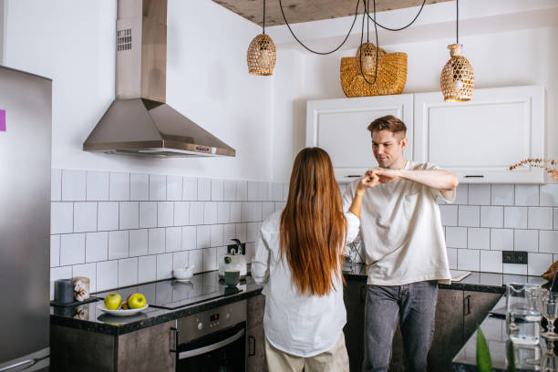 istock happy romantic couple dance in the kitchen 1225777992